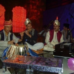 Three musicians in Hong Kong playing Indian music for a themed function