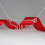 Wire name artist in HK make a Susan wire name necklace out of wires
