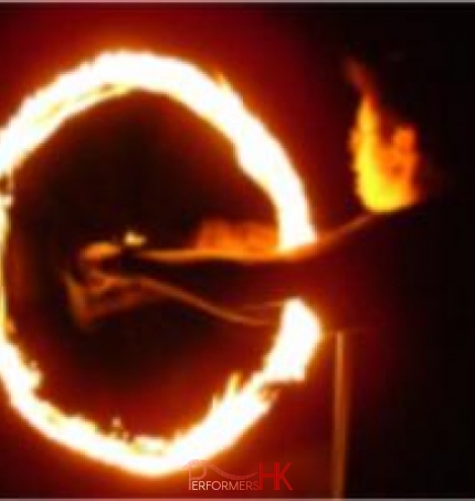 Professional fire performer in Hong Kong performing Fire Twirling for a annual dinner