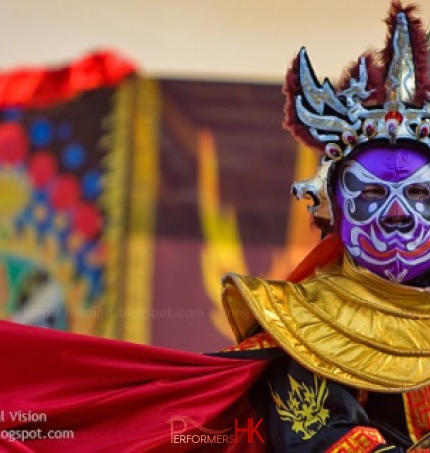 Hong Hong Traditional face changing performer performing at a Corporate event