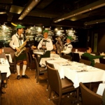 a three piece roving band in a restaurant in Hong Kong