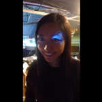 Trade fair in Hong Kong with glow in the dark face paint.