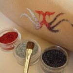 Tattoo with different colors of glitter