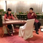 Two Chinese musicians performing live traditonal Chinese music