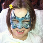 Devil face painting for Halloween event. 