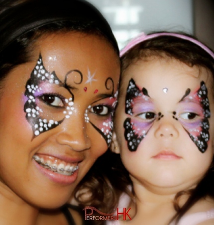 Mother and Child with butterfly face painting.