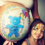 Custom belly face painting for expecting mothers