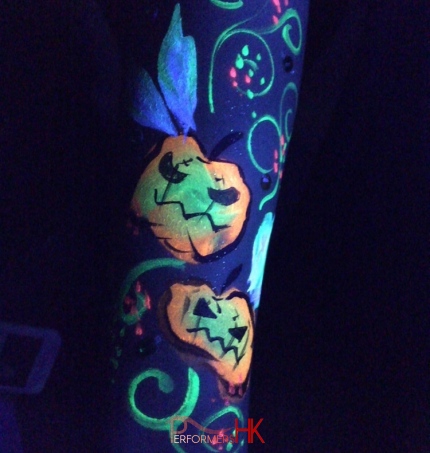 glowing the the dark body painted Halloween arm.