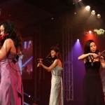Three Hong Kong violinist performing electric trio at a watch company product launch event