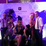 Gatsby dancers performing with male dancers at Fidelity annual dinner at Conrad hotel.