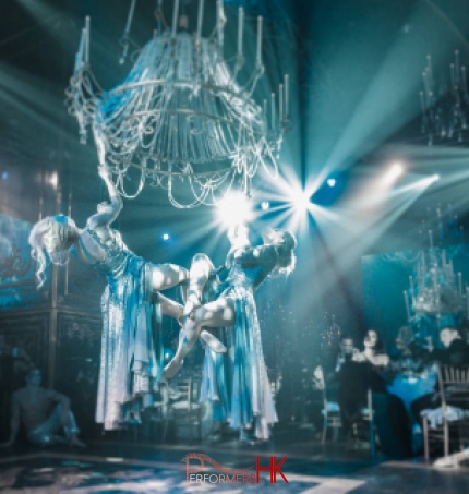 The guests at the annual dinner was amazed by two Hong Kong Aerial Chandelier performer performing