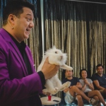 Josay performs with a live bunny.