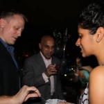 Magicians Shaun do magic tricks at a cocktail party in Hong Kong