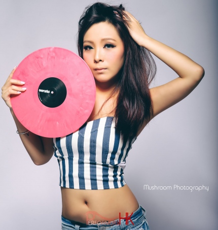 Female Dj Z wing promo shot holding pink vinyl
