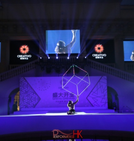 Blue stage with acrobatic performance of LED cube 