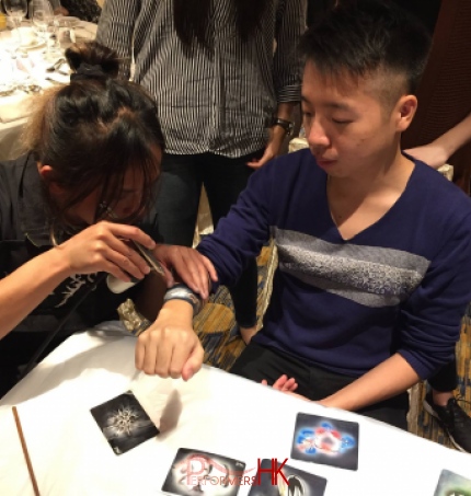 Artist spraying on tattoo for an event in Hong Kong