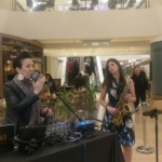 Dj vocalist and sax duo at cocktail event 