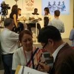 Caricaturist Mr Yeung at Spurs event drawing guests
