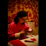 Artist working on a zodiac cut