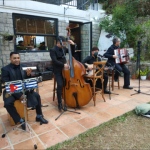 4 musicians in repluse bay Hong Kong, double bass, percussion, accordion, guitar combo