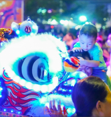 child with LED lion mascot for an event in hong kong 2023 by the hong kong government