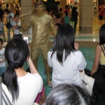 Living statue at a tennis themed event in New Town Plaza Sha tin and capturing the attention of mall patrons.