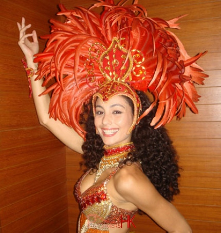 Brazilian dancer in Hong Kong taking photo at a event back stage