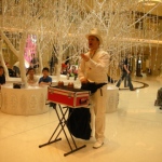 Andy performing roving magic at festival walk. 