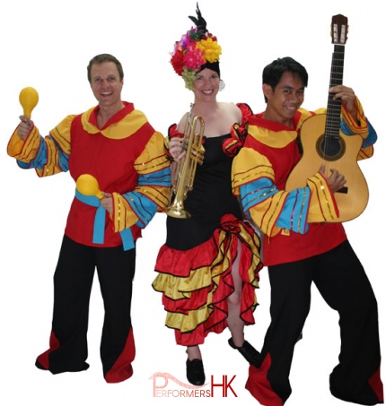 three people band in Spanish costumes