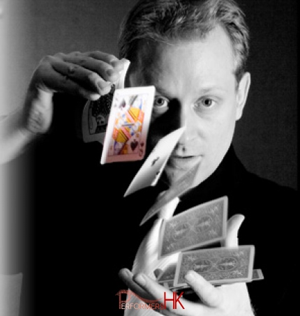 Magician ruffling cards