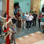 The female aerial skills performer catches the attention of many as she performs. 