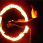 Ling doing his fire twirling act.