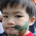 Cory can paint whatever the guest ask for - A little dinosaur face paint. 