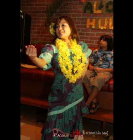 Female hula dancer performing in Hong Kong