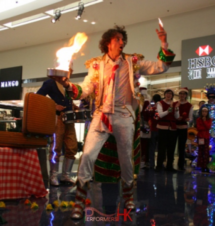 Juggler performing with fire at a Hong Kong shopping mall function