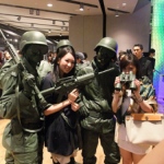 Toy soldiers posing with customers at a store event launch in Hysan Place Hong Kong.