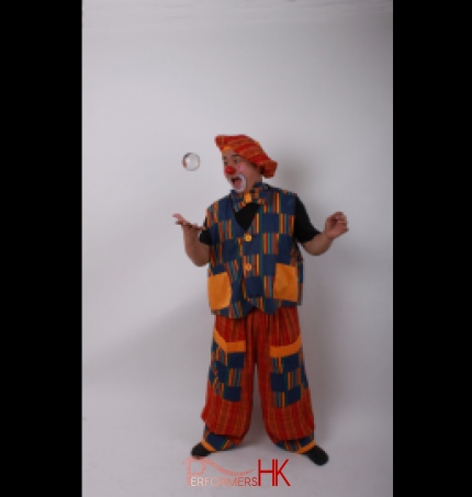 Hong Kong walk around clown juggler posing with his crystal ball