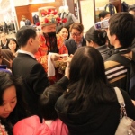 Choi Sun giving out Lai See at Causeway Bay Sogo.