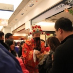 Choi Sun giving out Lai See at Tsim Sha Tsui Sogo. 