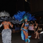 two samba dancers dancing whilst guests look on