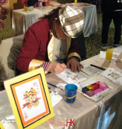 Hong Kong rainbow calligraphy artist  drawing a unique calligraphy at a Corporate annual dinner