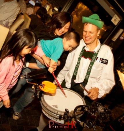 drummer teaches children how to play music 
