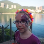 A sparkle half-face face paint.