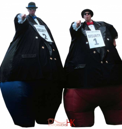 Two HK stilt walker in inflatable giant security guard costumes