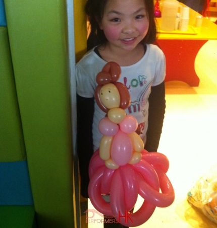 Walk around balloon artist made a Aurora balloon for a child at Hong Kong Aberdeen Marnia Club