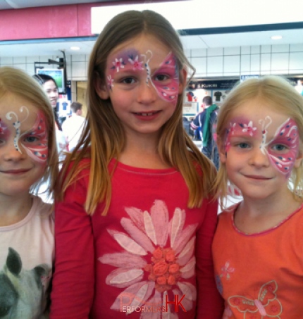 Three girls from a corporate event got a matching face paint from a face painter in HK 