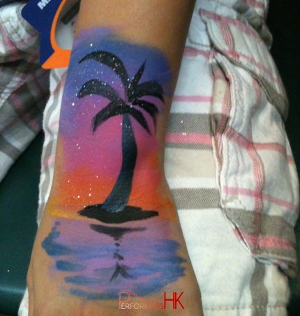 Beautiful Hawaii sunset hand paint from a face paining artist in Hong Kong. 