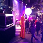 Entertaining guests at a night club opening in party district of Hong Kong.