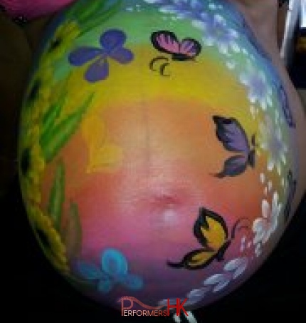 A face painter in HK draw a wonderful paint for a pregnant lady at a baby shower
