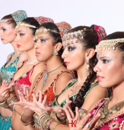 5 Dancers posing in Bollywood dance costumes